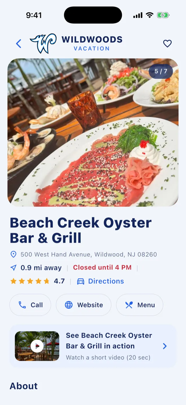 A restaurant listing showing photos, rating, opening hours and buttons to call, visit the website or see the menu.