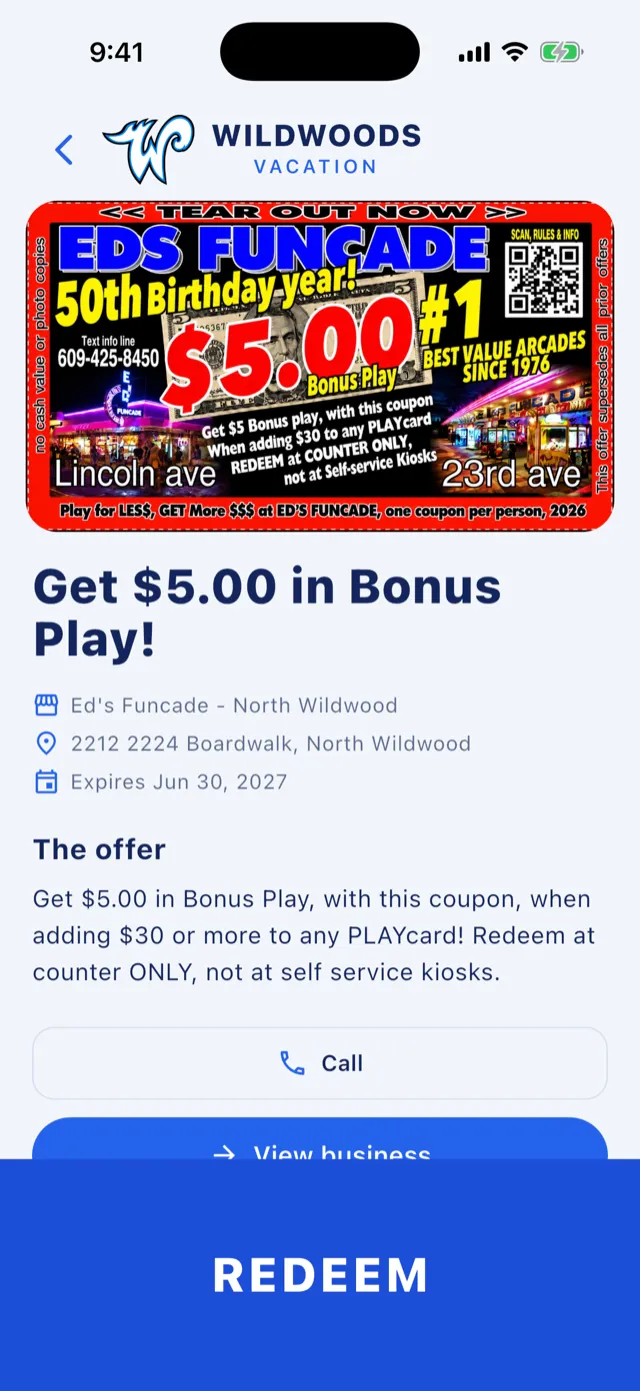 A coupon for bonus arcade play, with a large Redeem button across the bottom of the screen.